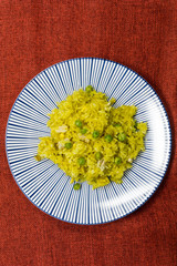 Homemade Chinese fried rice with vegetables and fried eggs