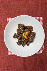 wok fried pork stir fry with sweet peppers and chinese vegetables