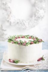 delicious festive gingerbread cake decorated with rosemary and sugar cranberries for Christmas