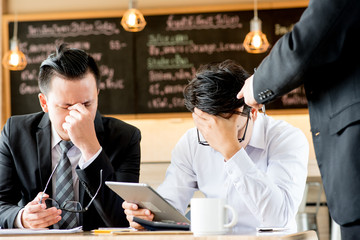 Business people show stressed of distress in meeting room