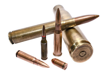 Military conceptioin: cartridges for large-caliber machine-gun, assault rifle and handgun closeup