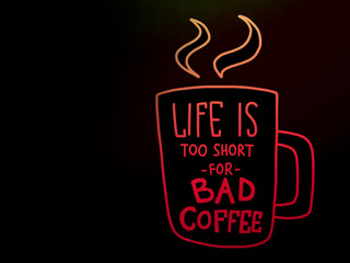 Life is too short for bad coffee word lettering on black background