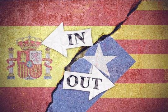 Catalonia referendum concept with arrow in and out on the flag concreate background
