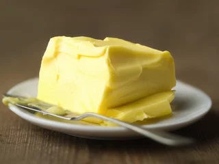 Foto op Plexiglas slab of soft butter © fkruger