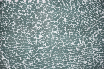 Broken glass, black background or texture