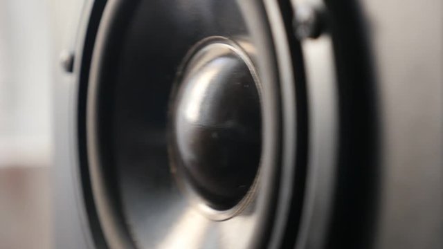 Playing low frequency sound on Hi-Fi music diaphragm slow-mo