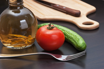 glass bottle with spices and vegetables
