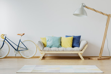 Colorful pillows on wooden couch