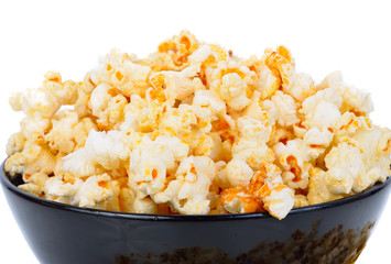 Popcorn in bowl on white background