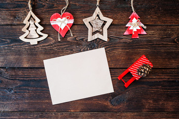 Mokcup Christmas composition of gift boxes and wooden toys on a background and place for text