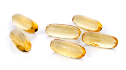 Fish oil pill on white background