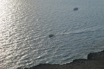 The coast with its rocky beach and clear water. High-rise shooting