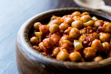 Chana Masala Chickpeas in wooden bowl.