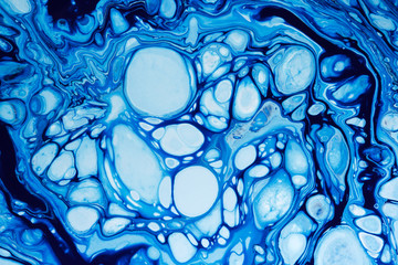 Abstract background of a mix blue color paints