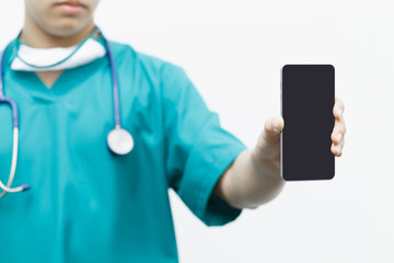 Asian smart doctor holding smartphone computer with hand. Surgeon has stethoscopes. concept of medical live in social online.