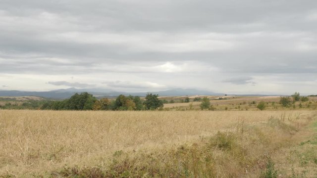 Slow tilt on Stol and Deli Jovan mountains on cloudy day 