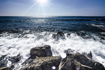 waves hitting the rocks