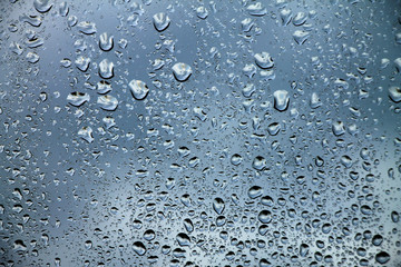 Rain drops on window glass , rainy day