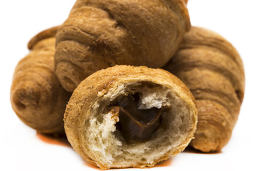 Fresh croissant isolated on white background. Home baking.