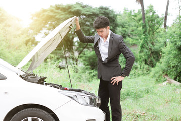 Businessman are broken car in work to days.