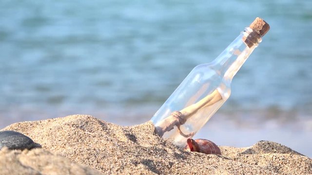Message in bottle, vacation on beach