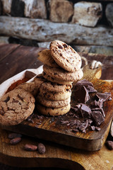 Chocolate cookies on wooden table. Chocolate chip cookies shot
