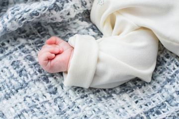 Fototapeta na wymiar hands of a newborn child