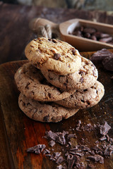 Chocolate cookies on wooden table. Chocolate chip cookies shot