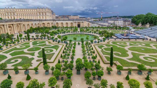 Famous palace Versailles with beautiful gardens timelapse.