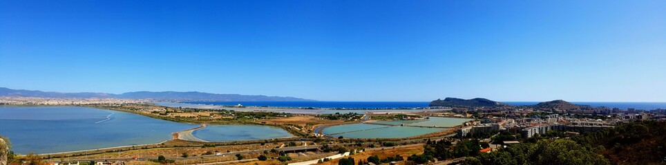 Fototapeta premium panoramic view of Cagliari and salt marshes from Monte Urpinu in a beautiful sunny day