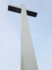 Cross against a light blue sky