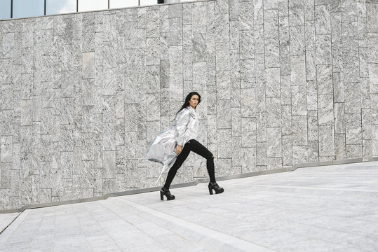 Stylish woman with a silver jacket