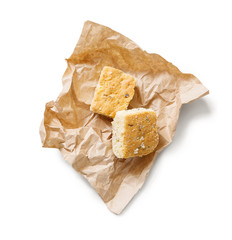 Tasty biscuit on craft paper isolated