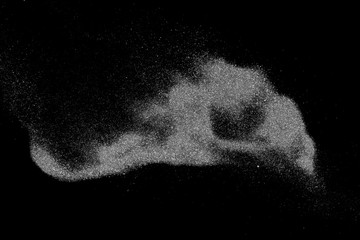 Powder explosion isolated on black background, abstract dust overlay texture, clipping path, top...