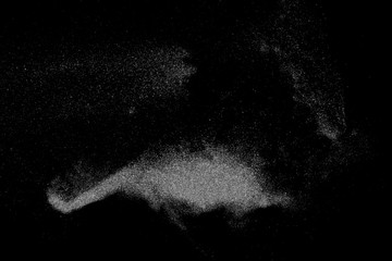 Powder explosion isolated on black background, abstract dust overlay texture, clipping path, top...