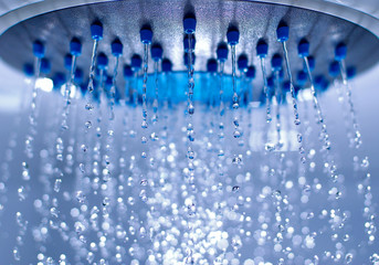 Plakat shower with flowing drops and streams of water