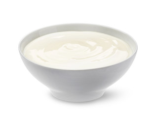 Sour cream in bowl isolated on white background