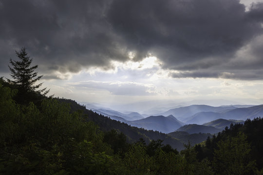 Storm clouds and sun over Blue Ridge Mountains