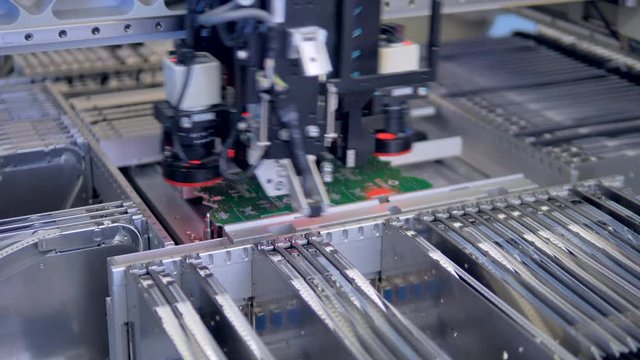 Automated robotics production machine. 4K.