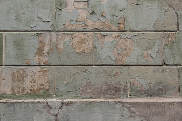 Stone wall with paint peeling off