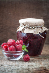 Raspberry jam with fresh raspberries