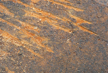 Old dirty brick surface with deep scratches