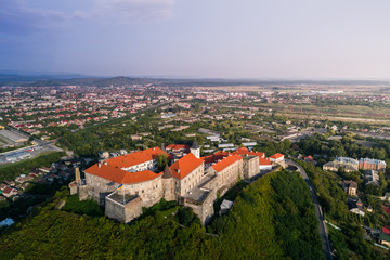 Obraz premium Aerial view of Palanok Castle, located on a hill in Mukacheve, Ukraine