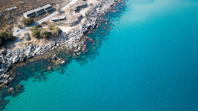 Aerial View: Drone video of iconic beach of Agathi and castle of Feraklos, Rodos island, Aegean, Greece