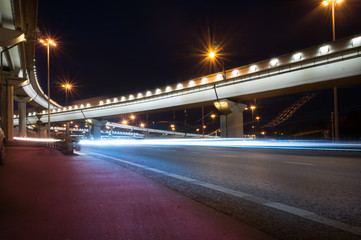 Fototapeta na wymiar Viaduct and the road at night