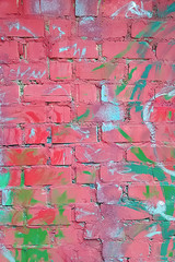 Red brick worn wall with abstract pattern. Background.