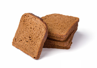 Pile Brown bread toast isolated over white. Low-calorie grain bread.