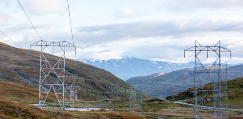 Hydro electric power lines crossing high mountains