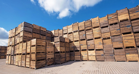 The accumulation of a large number of wooden crates on the site