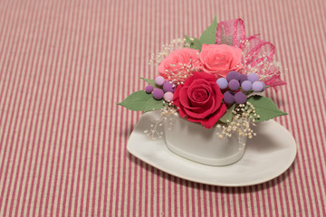 A Gift of Preservrd Flower and Clay Flower Arrangement, Pink and Red Roses